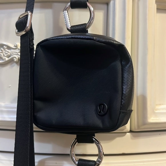 Lululemon crossbody bag, black, like new, originally $60. - Picture 3 of 4